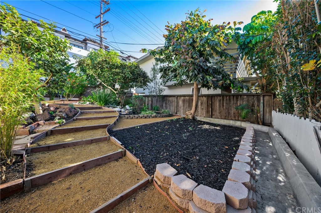101 Esplanade San Clemente, CA 92672 - Photo 37 of 54 a view of a backyard with plants and a patio