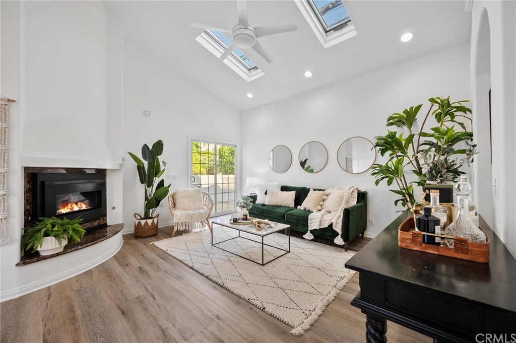 101 Esplanade San Clemente, CA 92672 - Photo 8 of 54 a living room with furniture a window and a flat screen tv