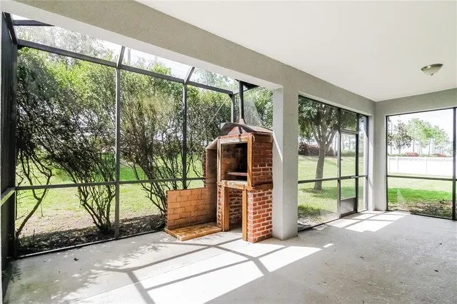 a view of livingroom with furniture and floor to ceiling window