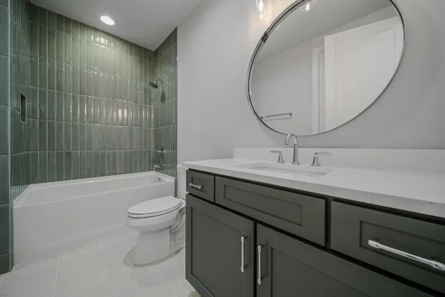 a kitchen with a sink appliances and cabinets