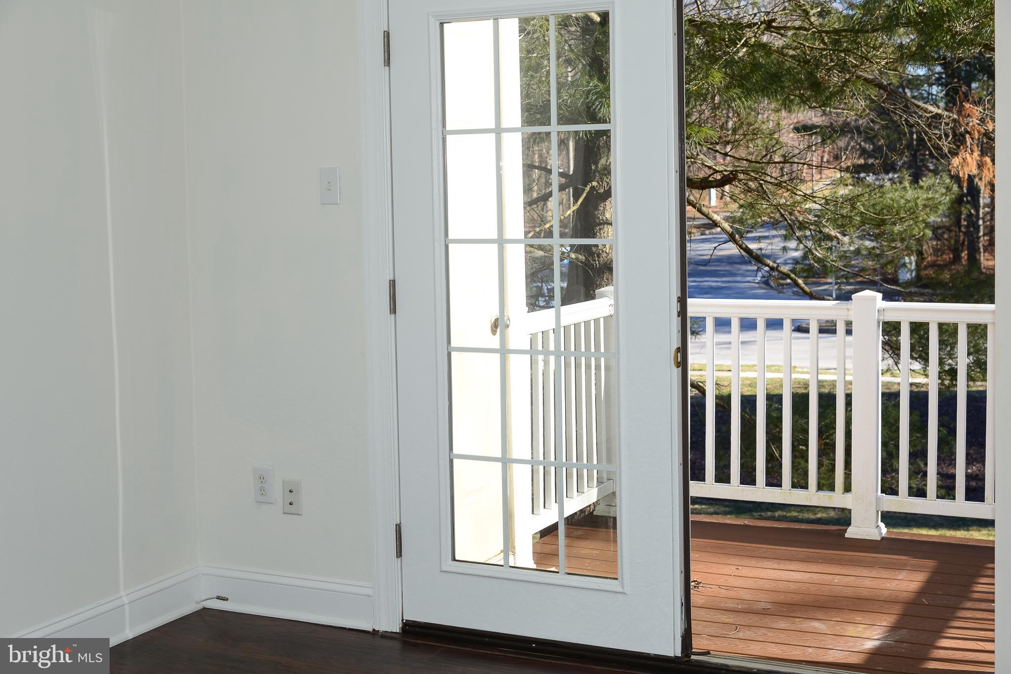 5900 Watch Chain Way, Unit 705 Columbia, MD 21044 - Photo 7 of 8 French door opening to the patio
