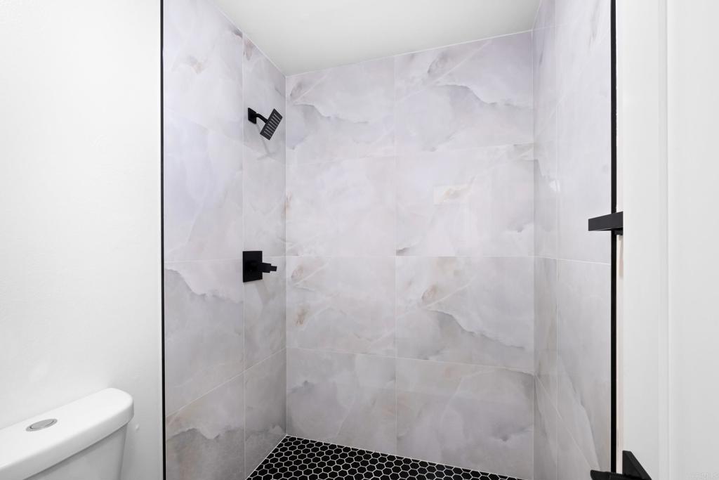 6775 Alvarado Road, Unit 26 San Diego, CA 92120 - Photo 24 of 24 a bathroom with a shower