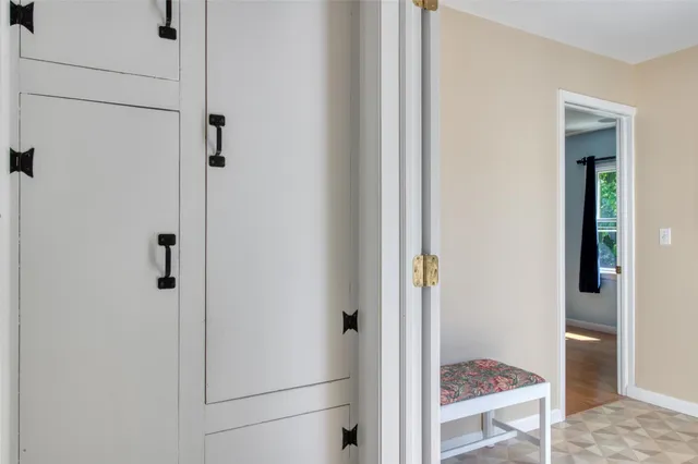a bathroom with a shower and toilet