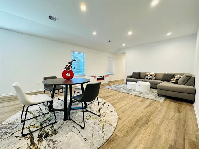 a living room with furniture and a couch