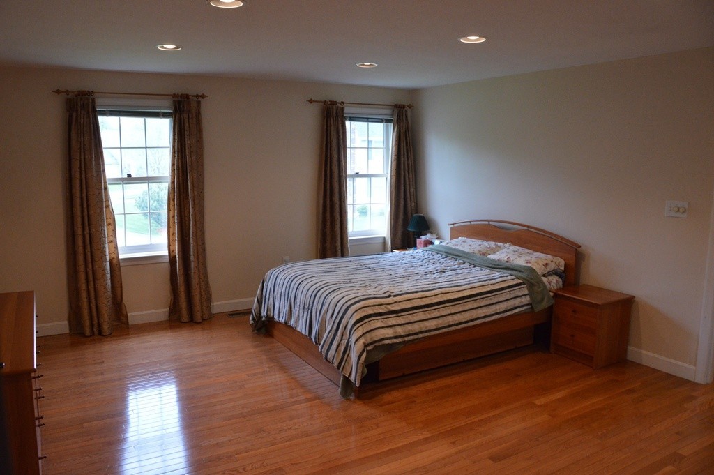 61 Stonegate Road Chelmsford, MA 01824 - Photo 7 of 17 a bedroom with a bed and window