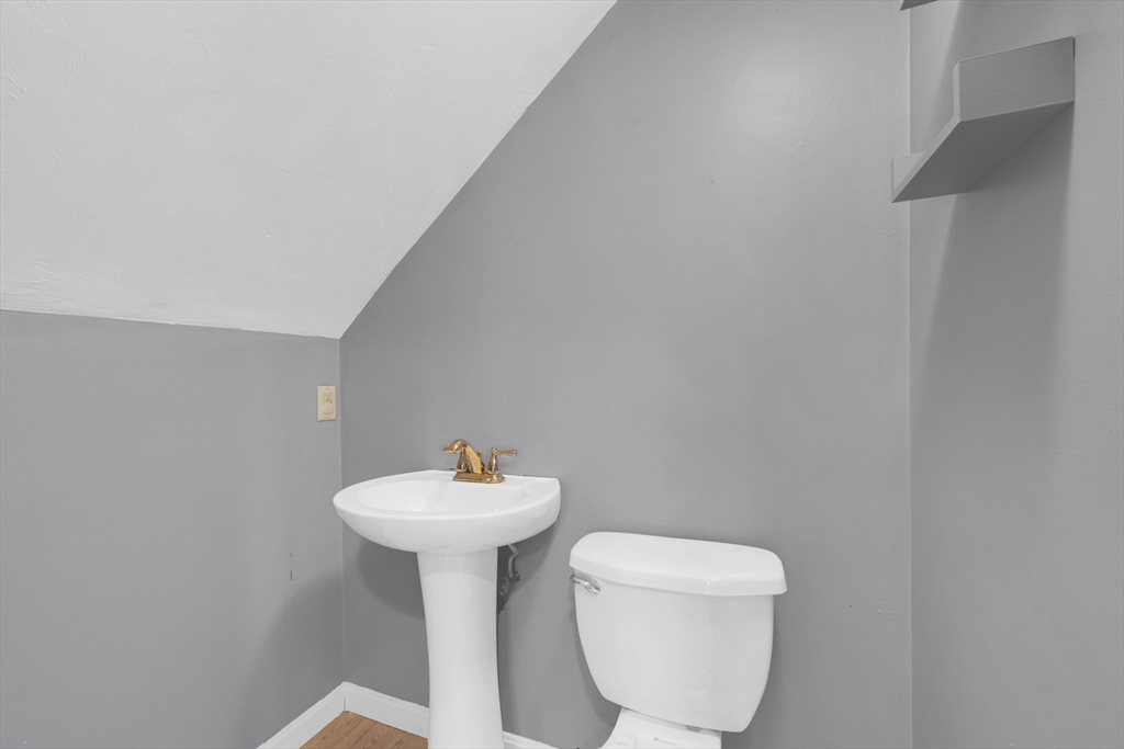 20 Leicester Street Oxford, MA 01537 - Photo 16 of 22 a bathroom with a toilet sink and mirror