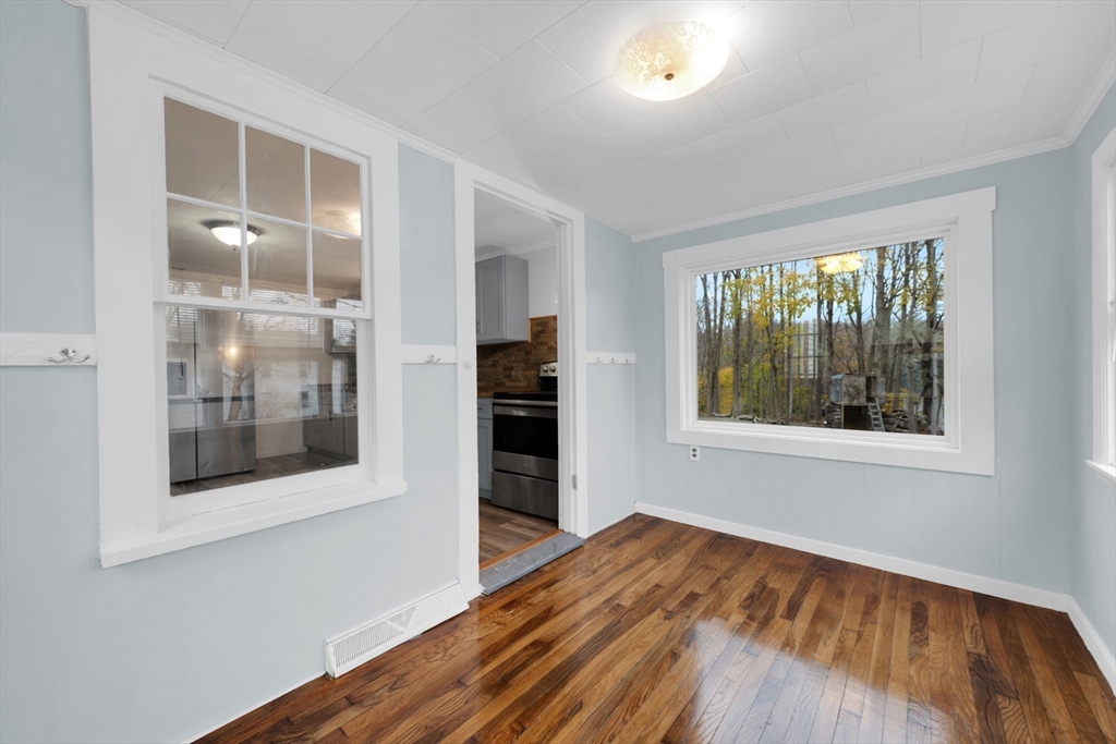 20 Leicester Street Oxford, MA 01537 - Photo 6 of 22 wooden floor in an empty room with a window