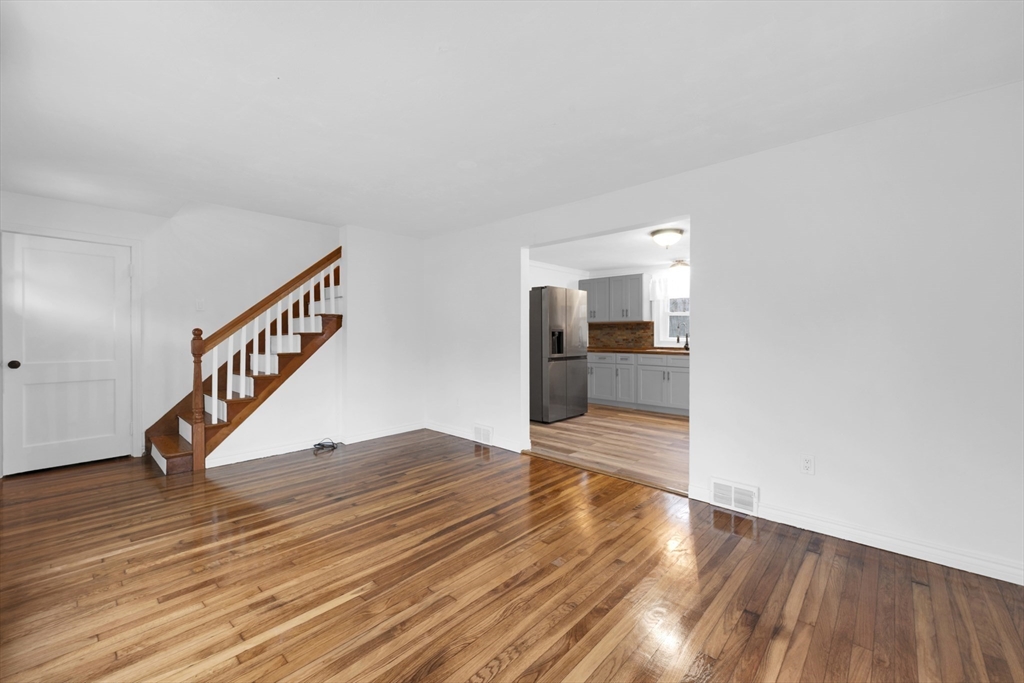 20 Leicester Street Oxford, MA 01537 - Photo 7 of 22 a view of an empty room with wooden floor