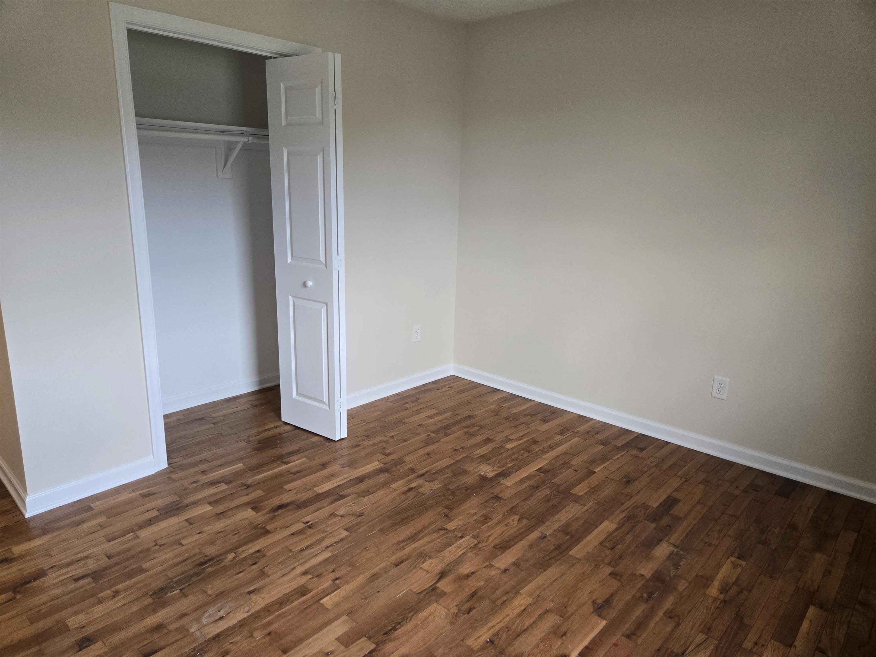307 West Spring Avenue Elkton, VA 22827 - Photo 14 of 28 a view of empty room with wooden floor