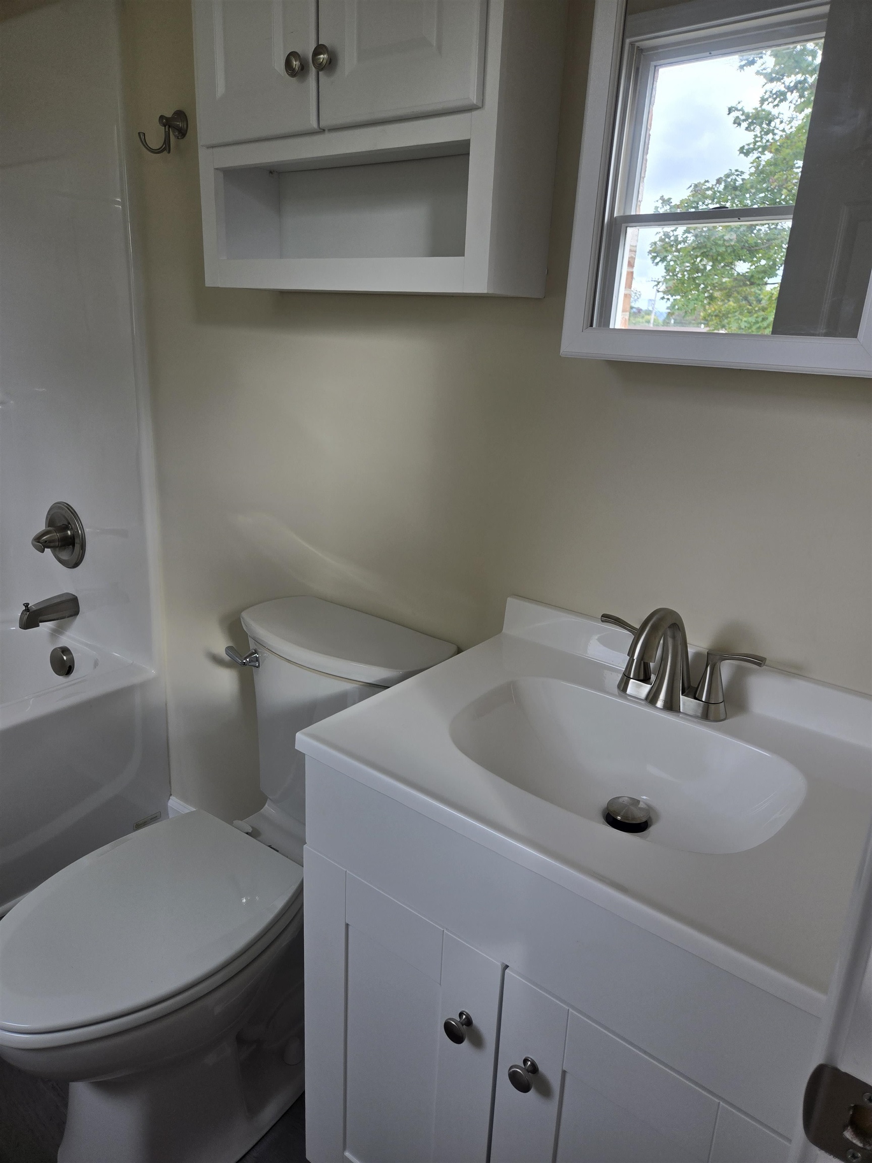 307 West Spring Avenue Elkton, VA 22827 - Photo 18 of 28 a bathroom with a sink and a toilet
