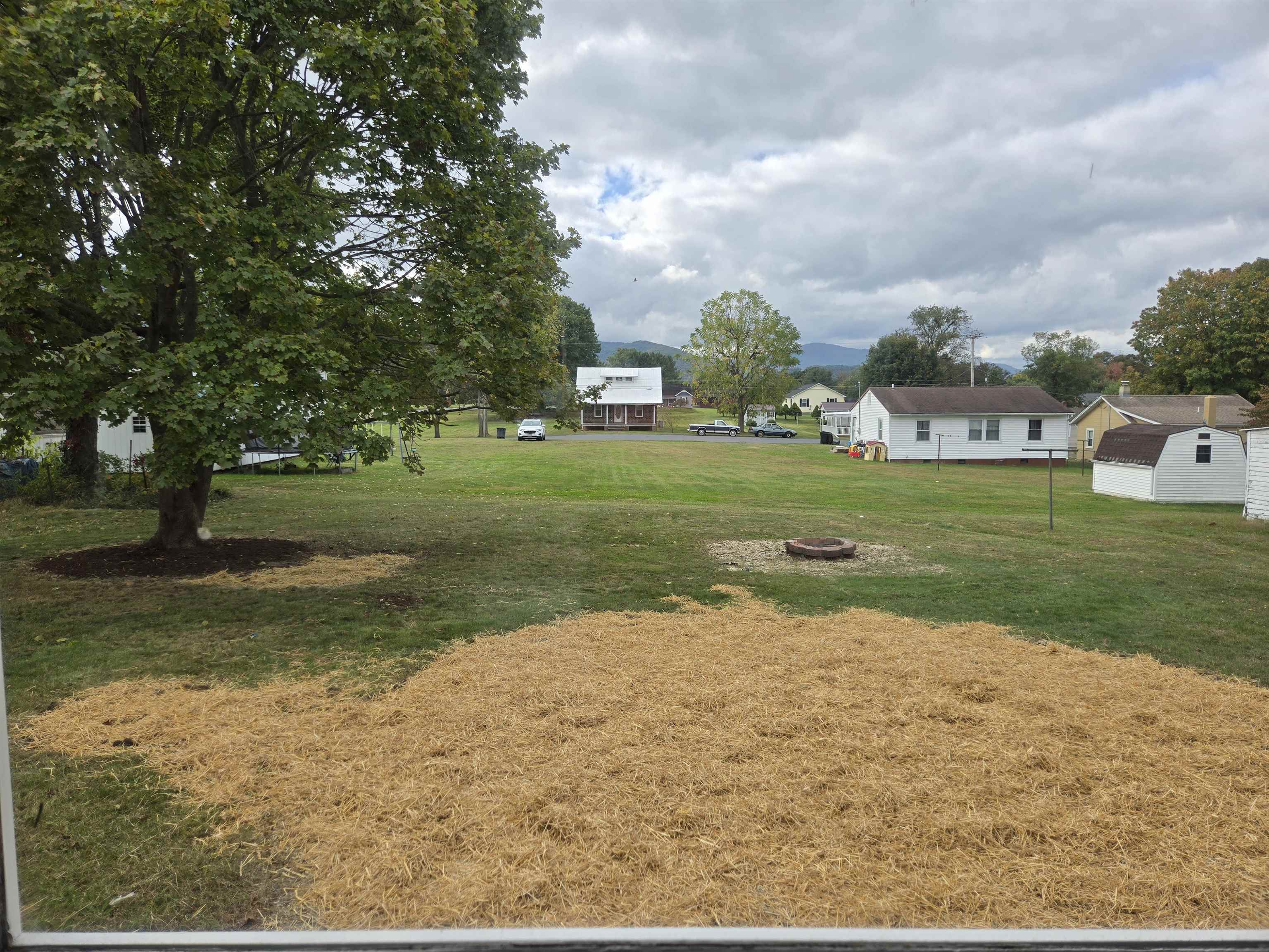 307 West Spring Avenue Elkton, VA 22827 - Photo 26 of 28 a view of a field of grass and trees