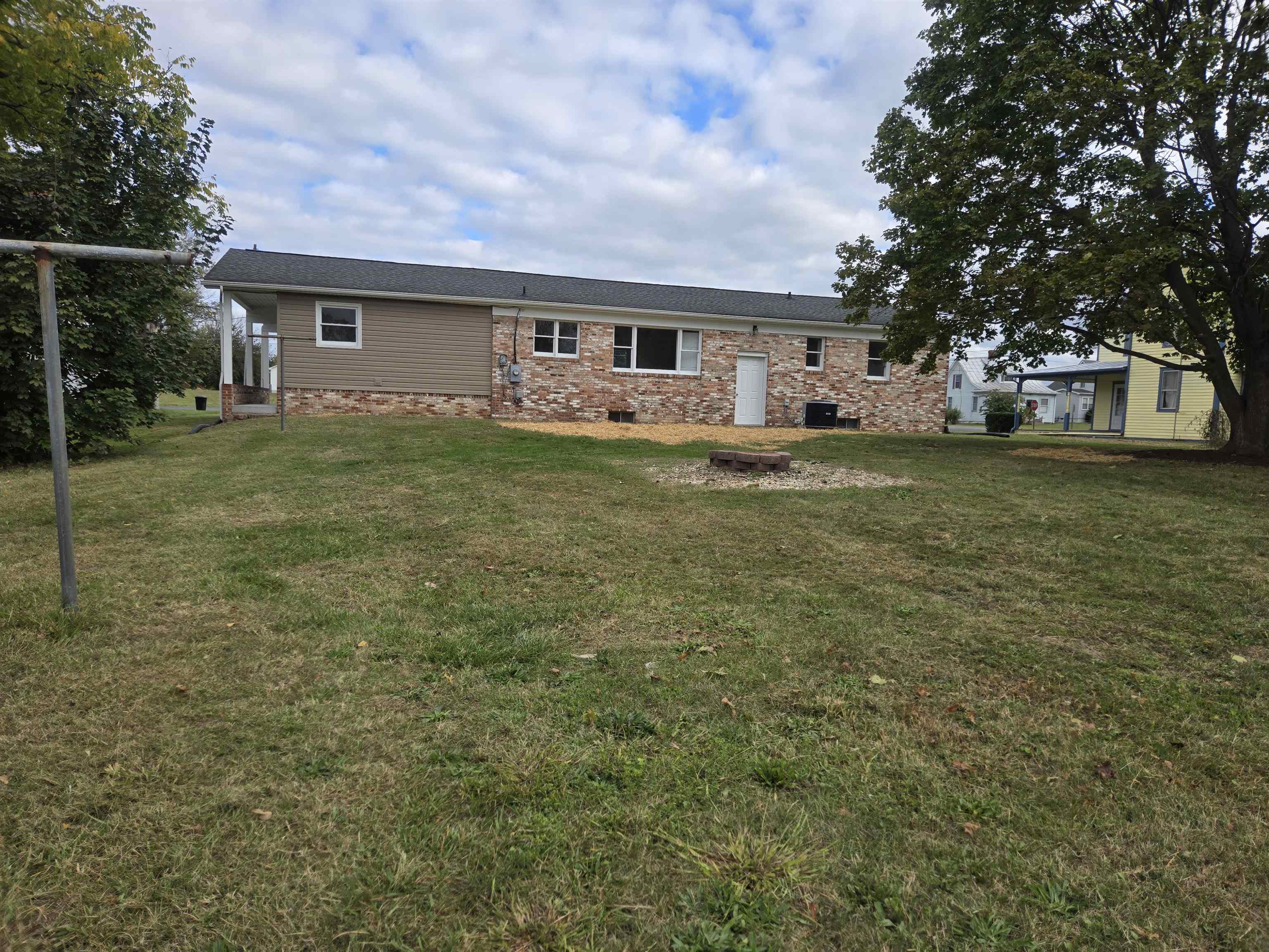 307 West Spring Avenue Elkton, VA 22827 - Photo 28 of 28 a front view of house with yard and green space