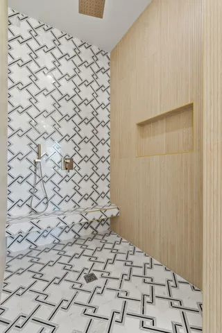 a bathroom with a sink a vanity and mirror