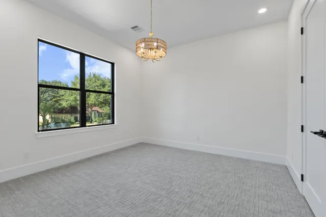 a bathroom with a granite countertop sink toilet mirror and shower