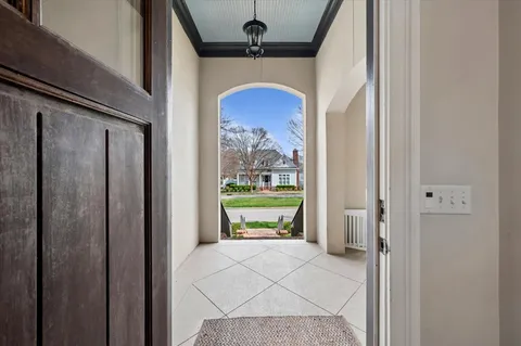 a view of a living room and dining room