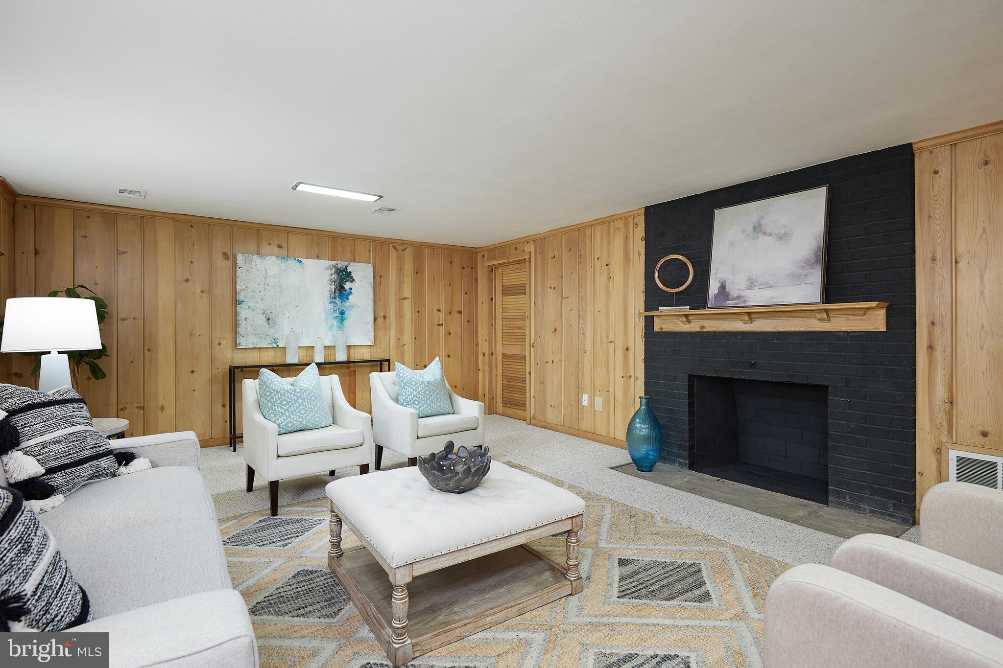 5518 Uppingham Street Chevy Chase, MD 20815 - Photo 28 of 50 Recreation Room with Fireplace