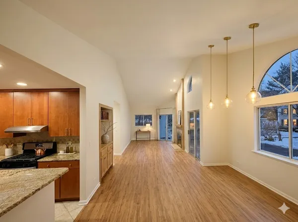 a view of a kitchen from the hallway