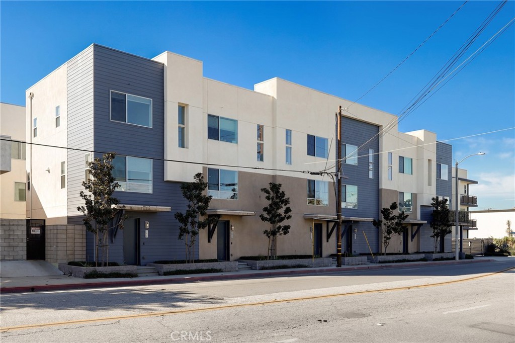 a front view of a building with street view