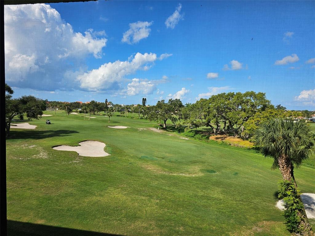 4119 61st Ave Terrace West, Unit 404 Bradenton, FL 34210 - Photo 21 of 22 a view of a golf course with a lake