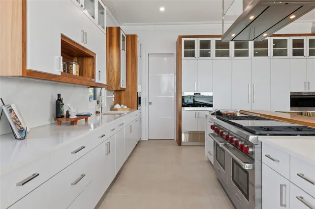 a kitchen with a stove and a sink
