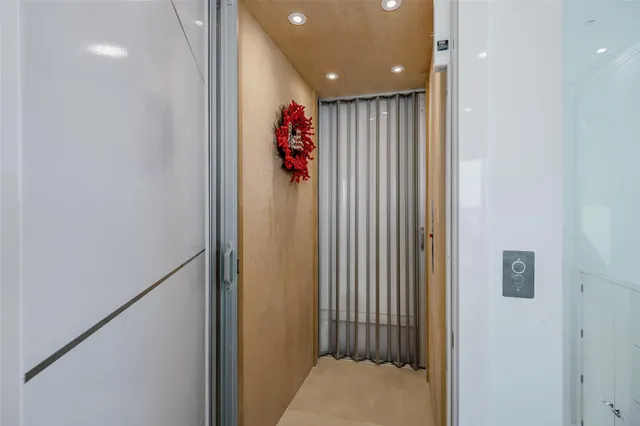 a view of a hallway with a elevator