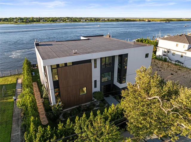 a view of a house with a garden