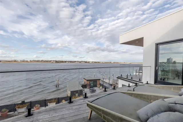 a view of roof deck with seating space