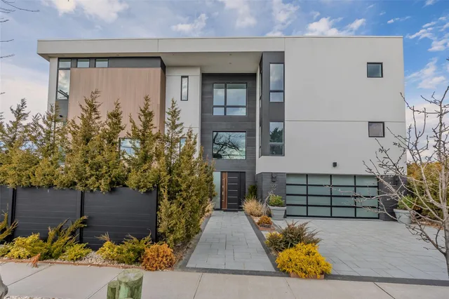 a view of a lake with a house in the background