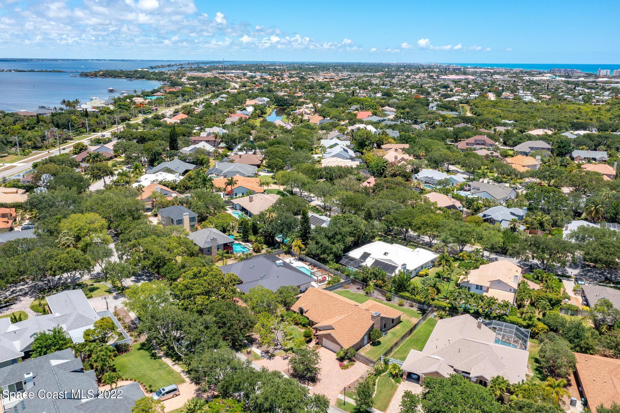 588 Peregrine Drive Indialantic, FL 32903 - Photo 21 of 23 an aerial view of residential houses with outdoor space