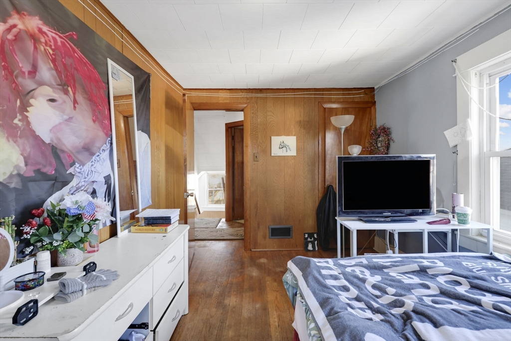 59 Prospect Street Ludlow, MA 01056 - Photo 18 of 42 a living room with furniture and a flat screen tv
