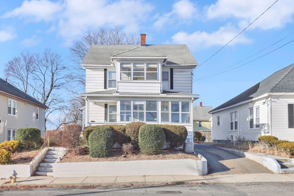 59 Prospect Street Ludlow, MA 01056 - Photo 2 of 42 a front view of a house with a garden