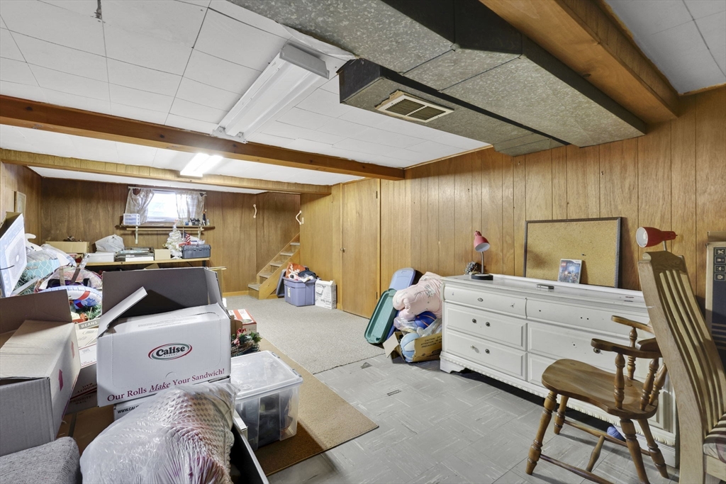 59 Prospect Street Ludlow, MA 01056 - Photo 27 of 42 a bed room with furniture and a window