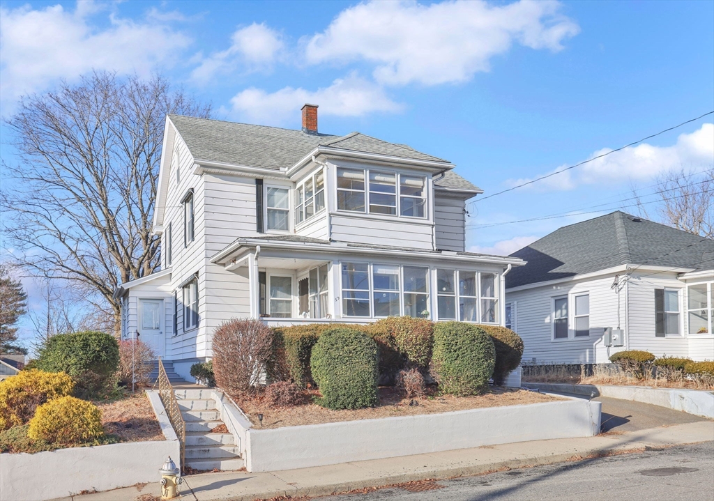 59 Prospect Street Ludlow, MA 01056 - Photo 3 of 42 a front view of a house with a yard