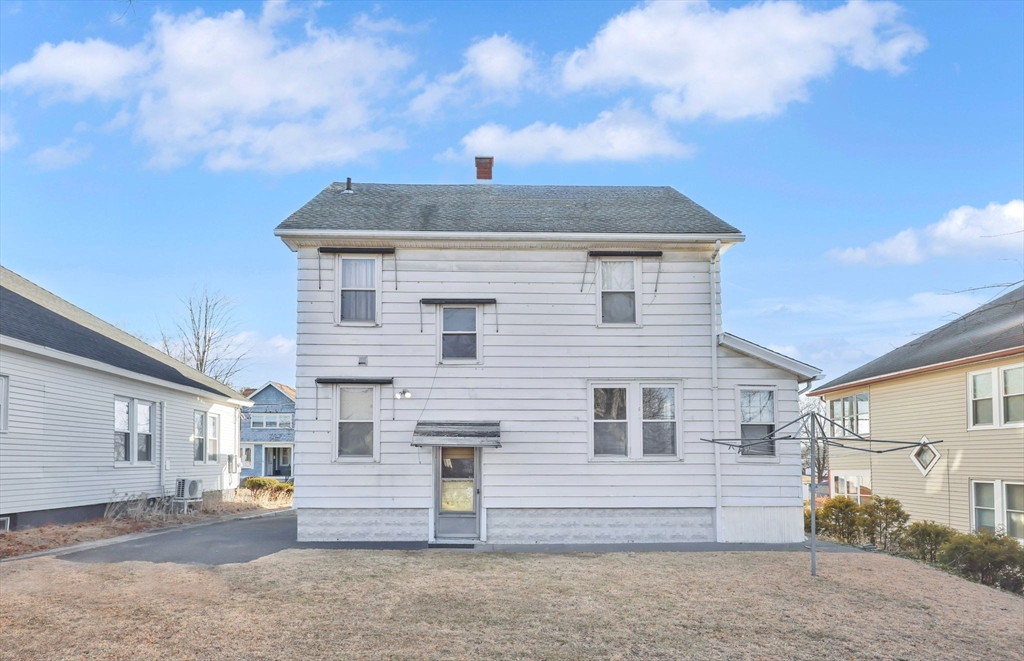 59 Prospect Street Ludlow, MA 01056 - Photo 38 of 42 a front view of a house with a yard