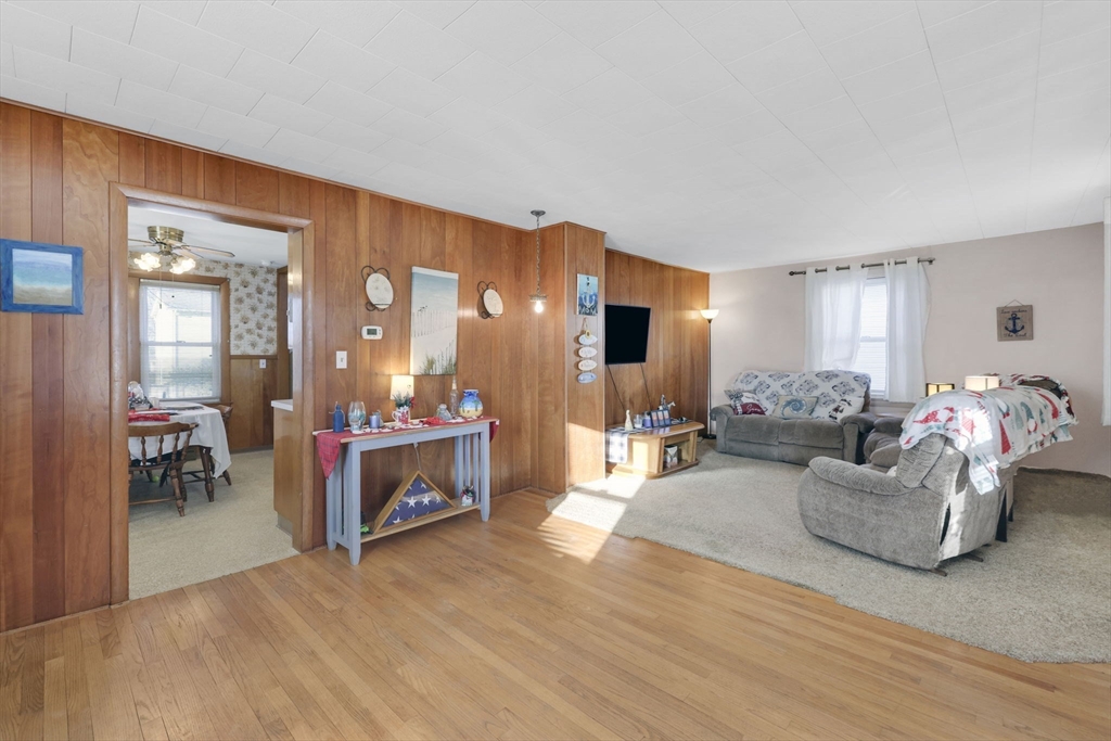 59 Prospect Street Ludlow, MA 01056 - Photo 7 of 42 a living room with furniture and a dining room