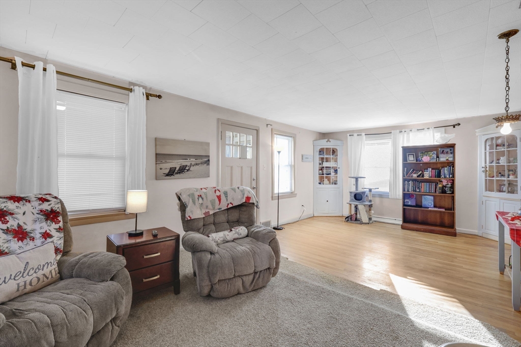 59 Prospect Street Ludlow, MA 01056 - Photo 8 of 42 a living room with furniture and a window