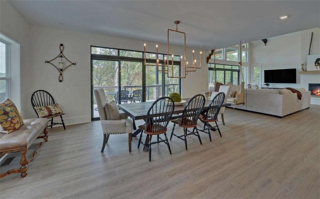 333 Favor Rabun Gap, GA 30568 - Photo 29 of 97 a view of a dining room with furniture window and wooden floor