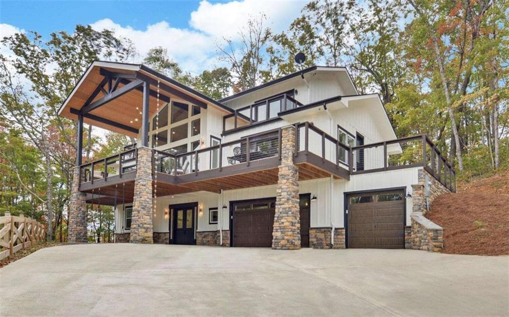 333 Favor Rabun Gap, GA 30568 - Photo 35 of 97 a front view of a house with a tree