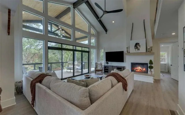 a bathroom with a shower a toilet and a sink
