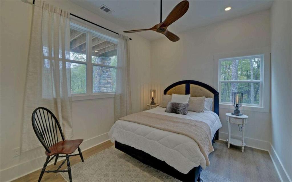 333 Favor Rabun Gap, GA 30568 - Photo 47 of 97 a bedroom with a bed and a window