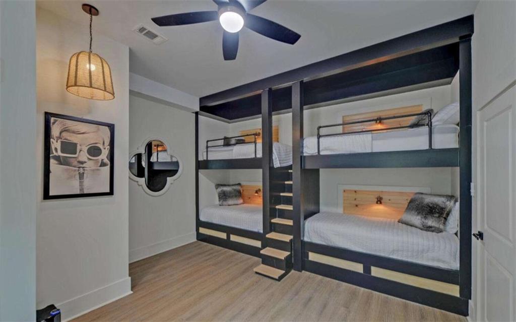 333 Favor Rabun Gap, GA 30568 - Photo 50 of 97 a bedroom with furniture and a lamp