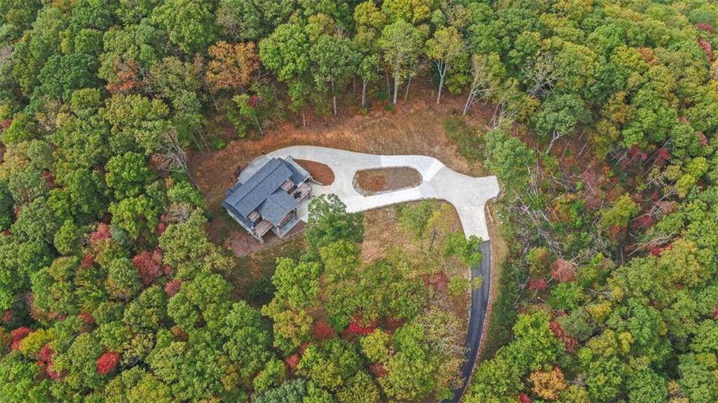 333 Favor Rabun Gap, GA 30568 - Photo 6 of 97 a view of a lake with a house in the background