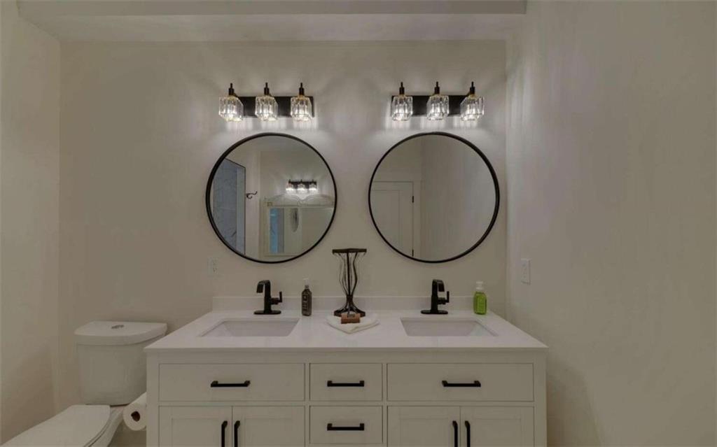 333 Favor Rabun Gap, GA 30568 - Photo 63 of 97 a bathroom with a sink and a mirror