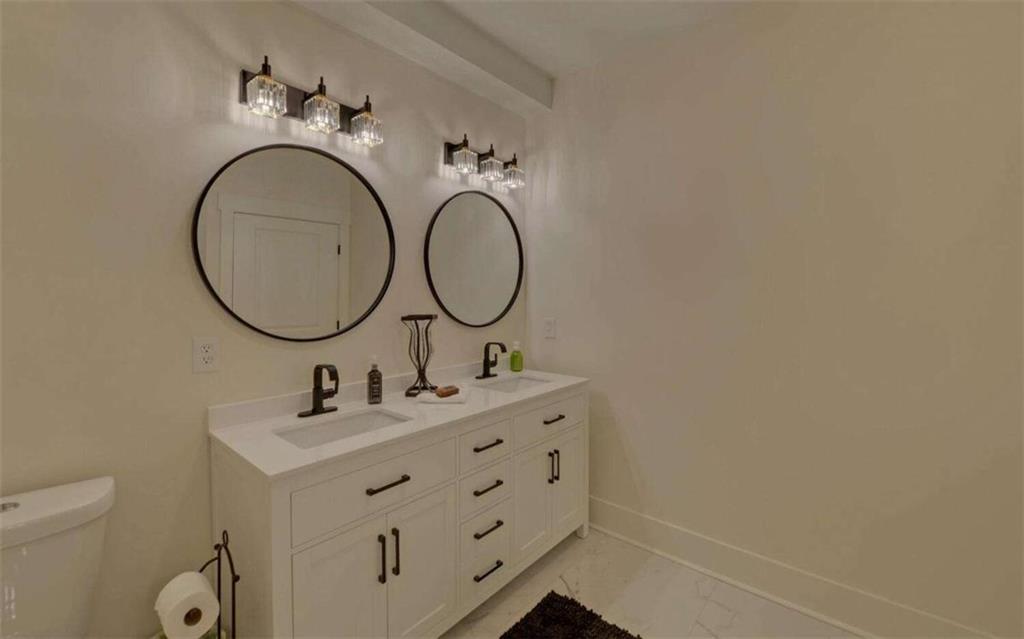 333 Favor Rabun Gap, GA 30568 - Photo 64 of 97 a bathroom with a sink and a mirror