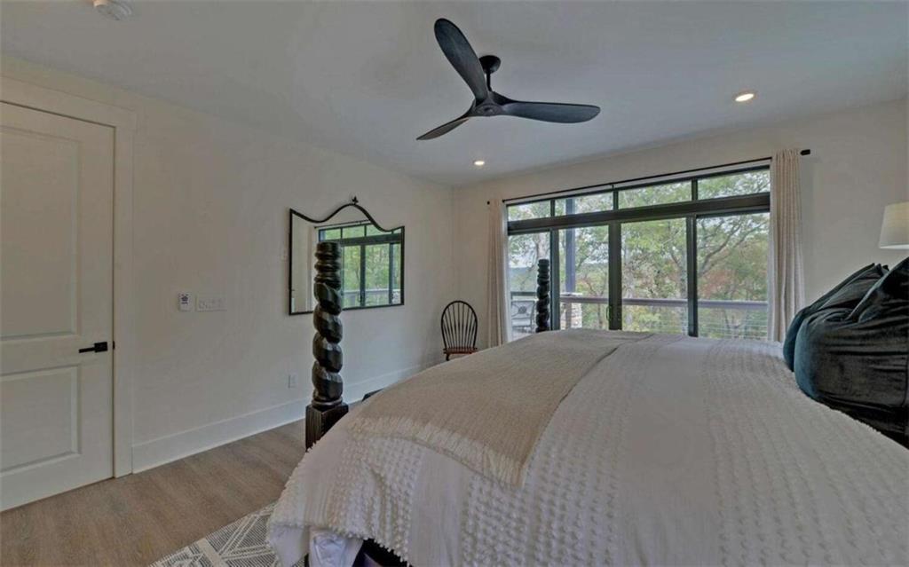 333 Favor Rabun Gap, GA 30568 - Photo 69 of 97 a bedroom with a bed and a large window