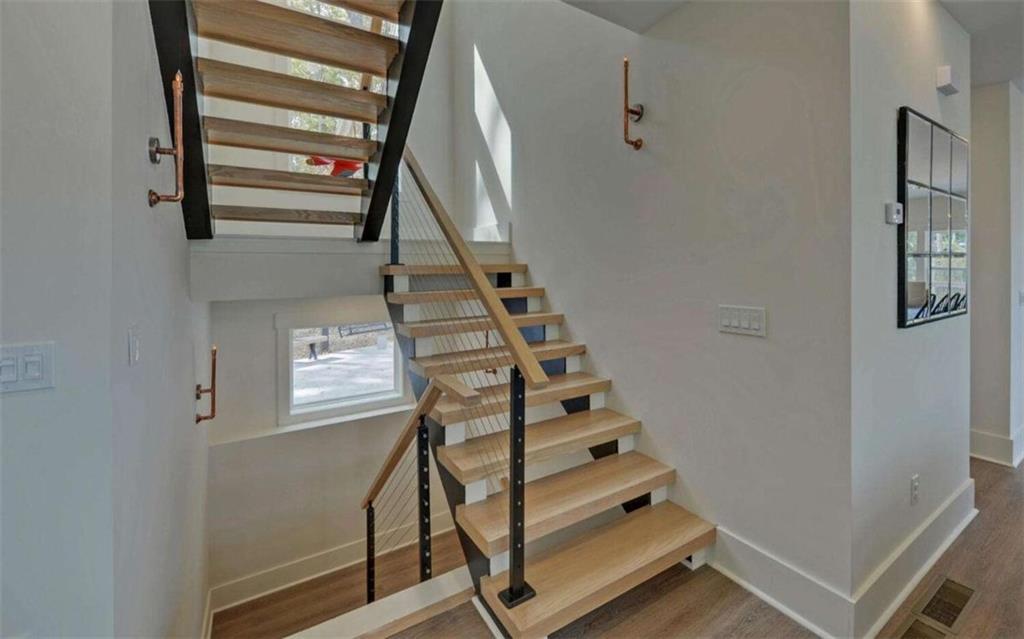 333 Favor Rabun Gap, GA 30568 - Photo 74 of 97 a view of entryway with wooden floor and stairs