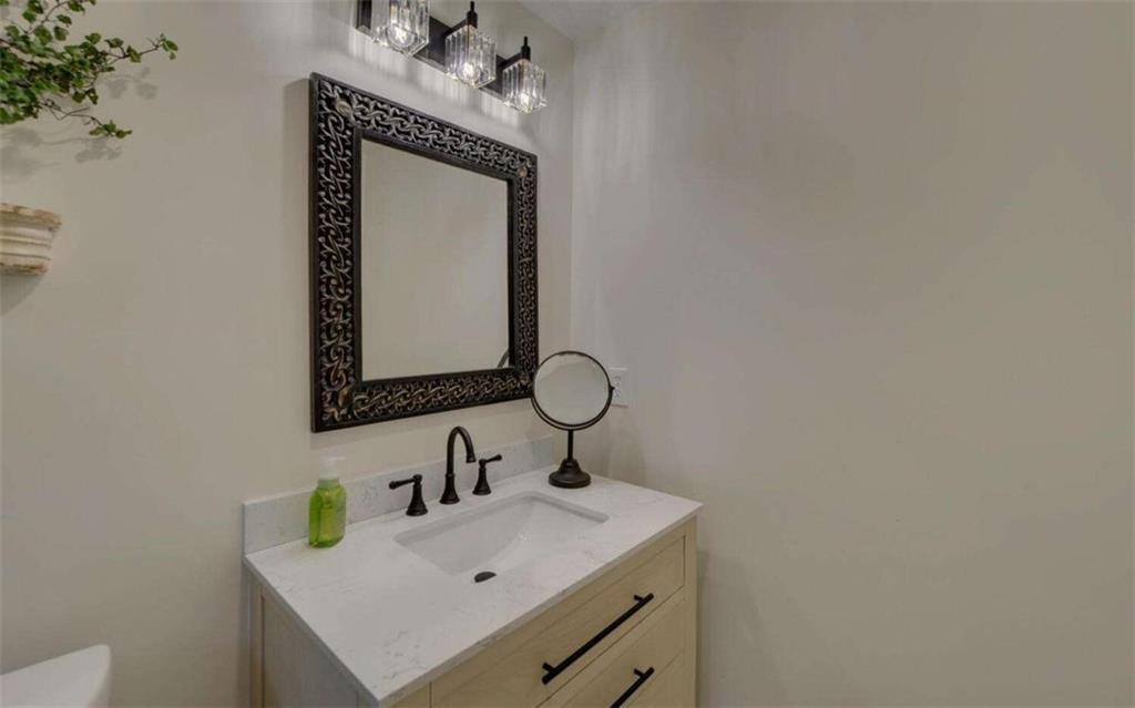 333 Favor Rabun Gap, GA 30568 - Photo 84 of 97 a bathroom with a sink and mirror