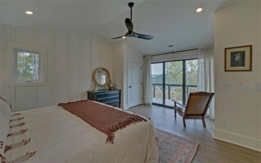 333 Favor Rabun Gap, GA 30568 - Photo 86 of 97 a bedroom with a bed and a chair