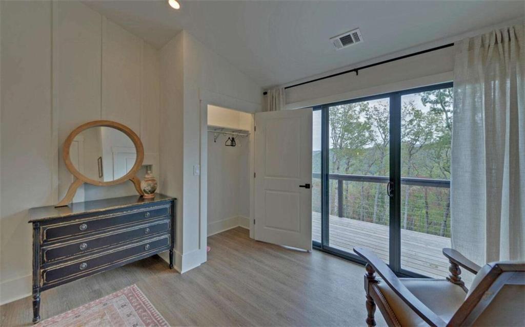 333 Favor Rabun Gap, GA 30568 - Photo 89 of 97 a room with furniture and a window