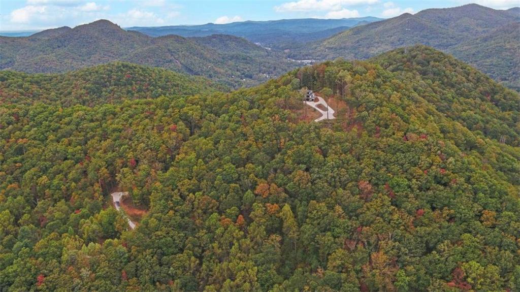 333 Favor Rabun Gap, GA 30568 - Photo 10 of 97 a view of a lush green hillside and a houses